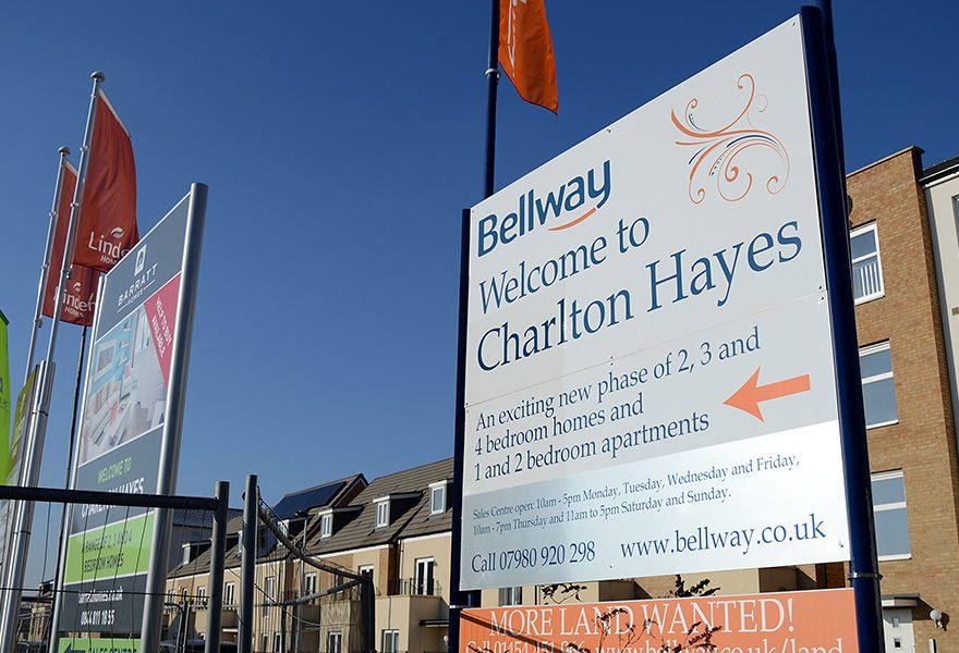 Photo of house builders' advertising signs at Charlton Hayes.