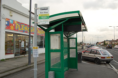 Bus stop outside the Flingers party shop in Patchway, Bristol
