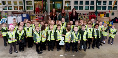 Pupils at Callicroft Primary School, Patchway wearing high visibility vests donated by Specsavers.