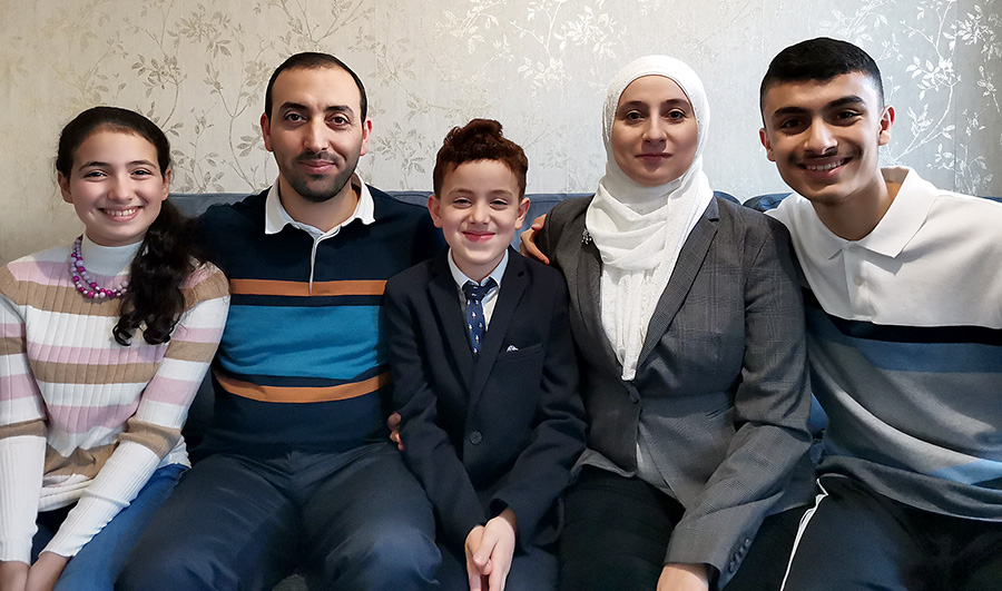 Photo of Syrian refugee Hisham Alsaiyad and family.